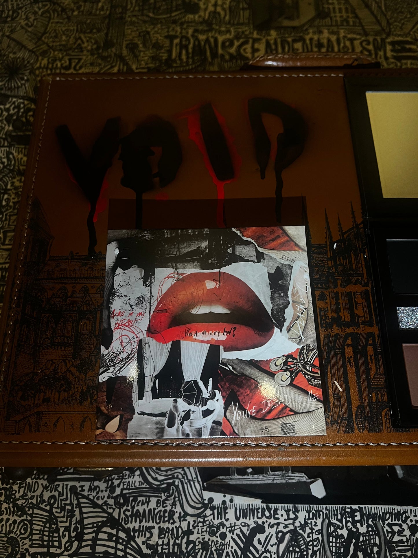 Collage with red lips on a textured surface