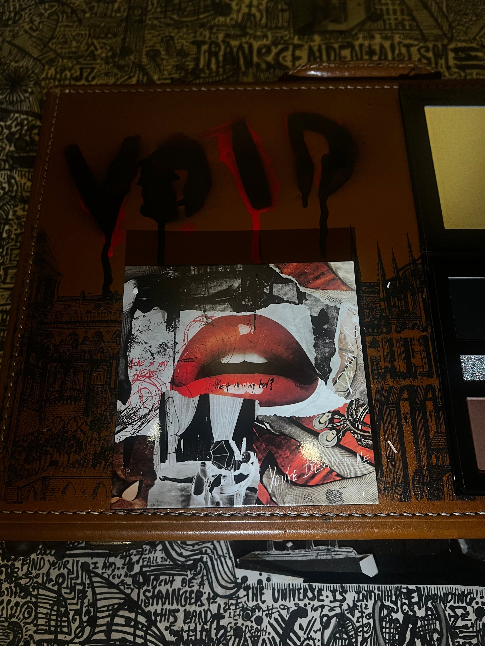 Collage with red lips on a textured surface