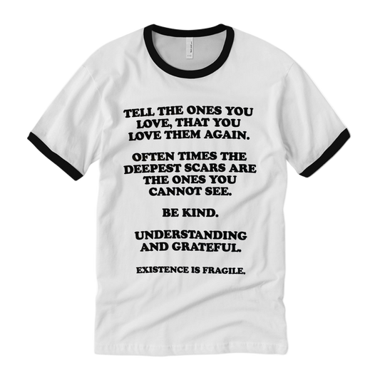 White t-shirt with black text