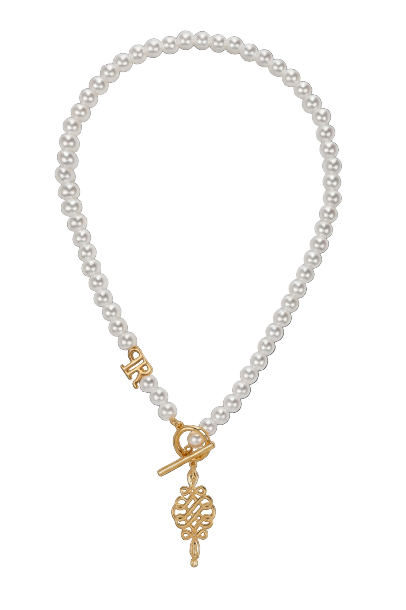 Pearl necklace with a gold charm