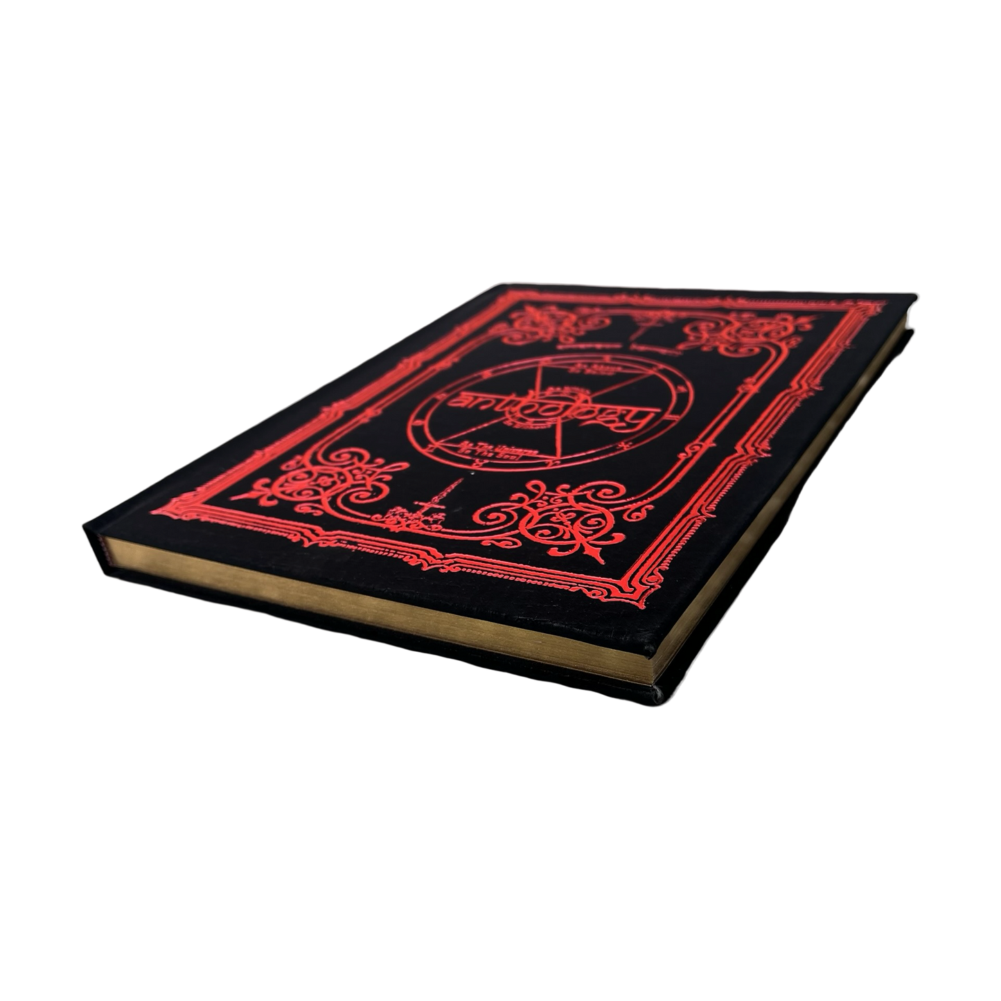 Decorative book with red and gold design on a white background