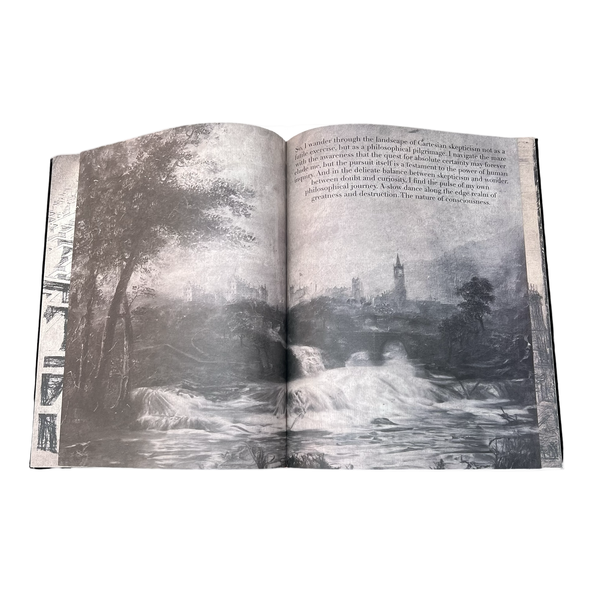 Open book with black and white landscape illustration on a white background