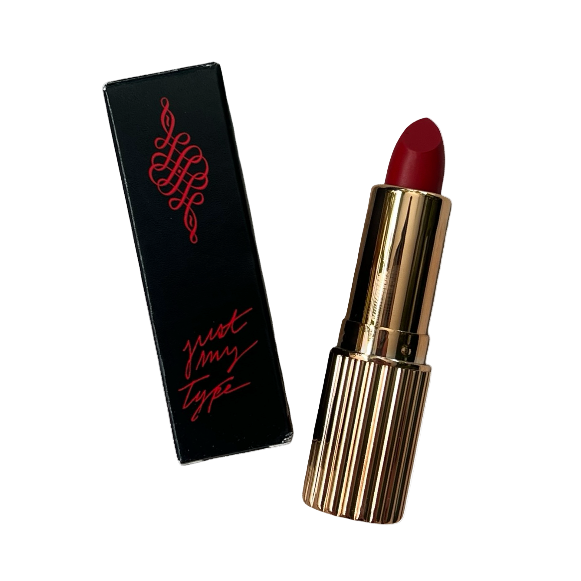 Red lipstick with gold casing and black packaging featuring red text on a white background