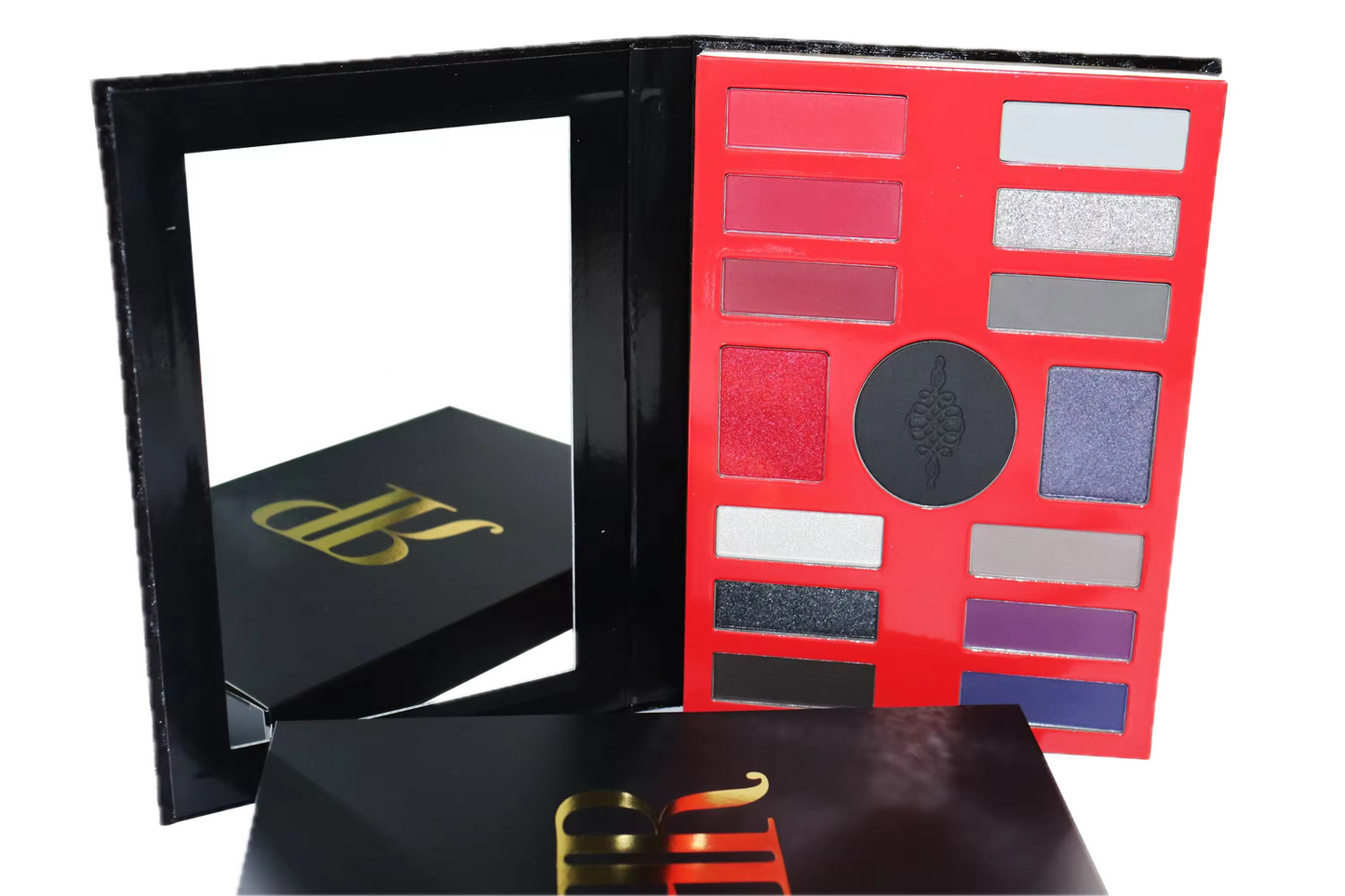 Makeup palette with color swatches and a black box with gold lettering on a white background