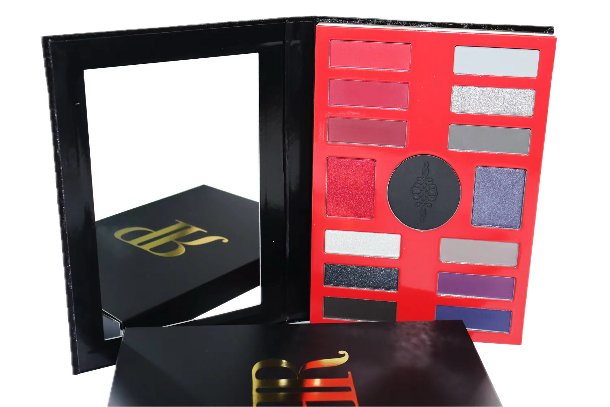 Makeup palette with color swatches and a black box with gold lettering on a white background