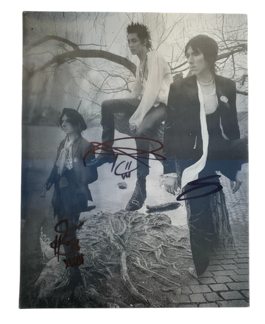 Collage of three people in a stylized setting with signatures on it
