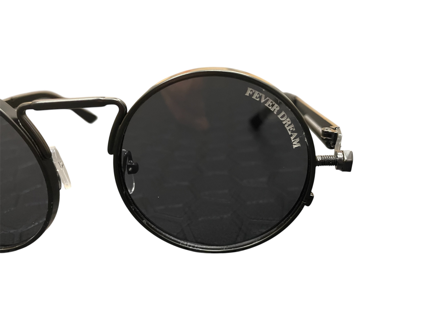 Round sunglasses with metallic frame and 'Fever Dream' branding on a white background