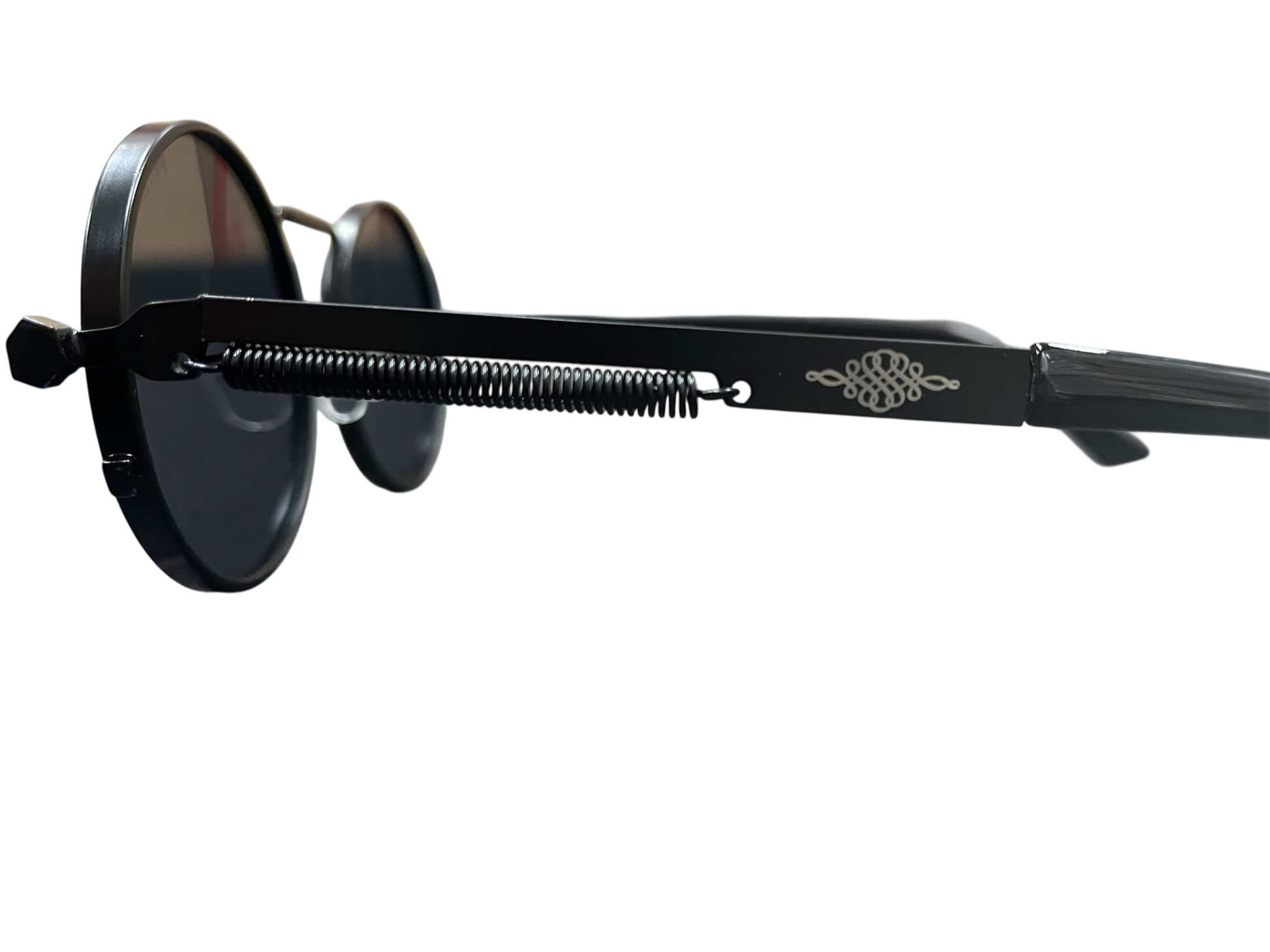 Black sunglasses with a decorative arm on a white background