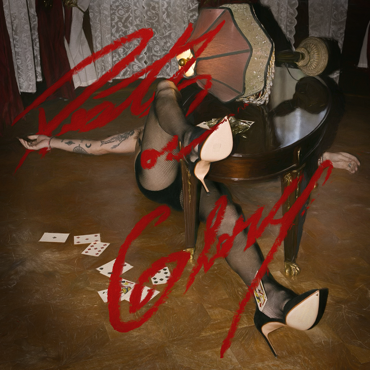 Person in high heels and stockings on a piano with red text overlay