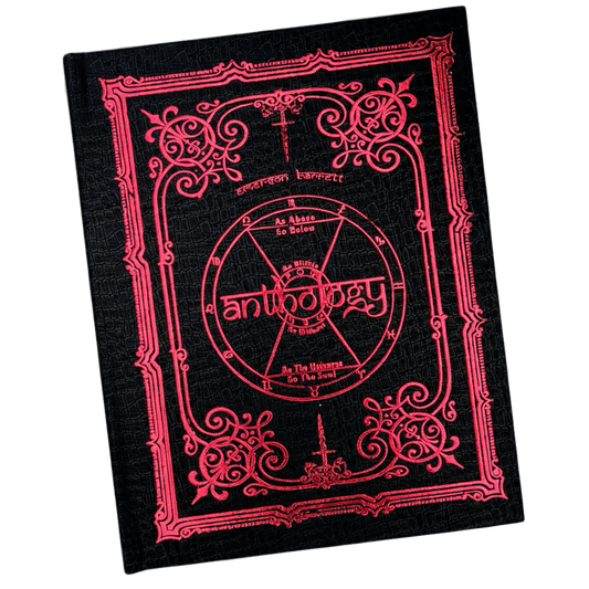 Black book with red decorative text and symbols on a transparent background